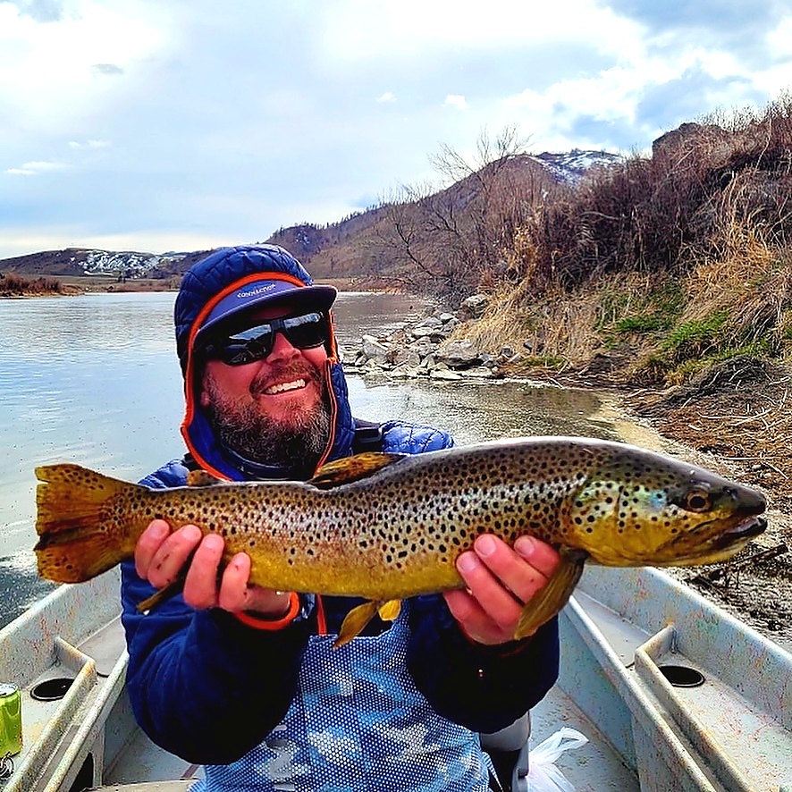 Jason fishing solo in winter on a Montana river