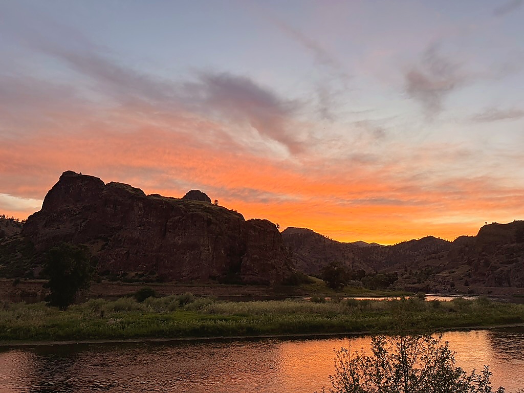 Dramatic river canyon at sunset — Zoo Town Anglers international fly fishing expeditions